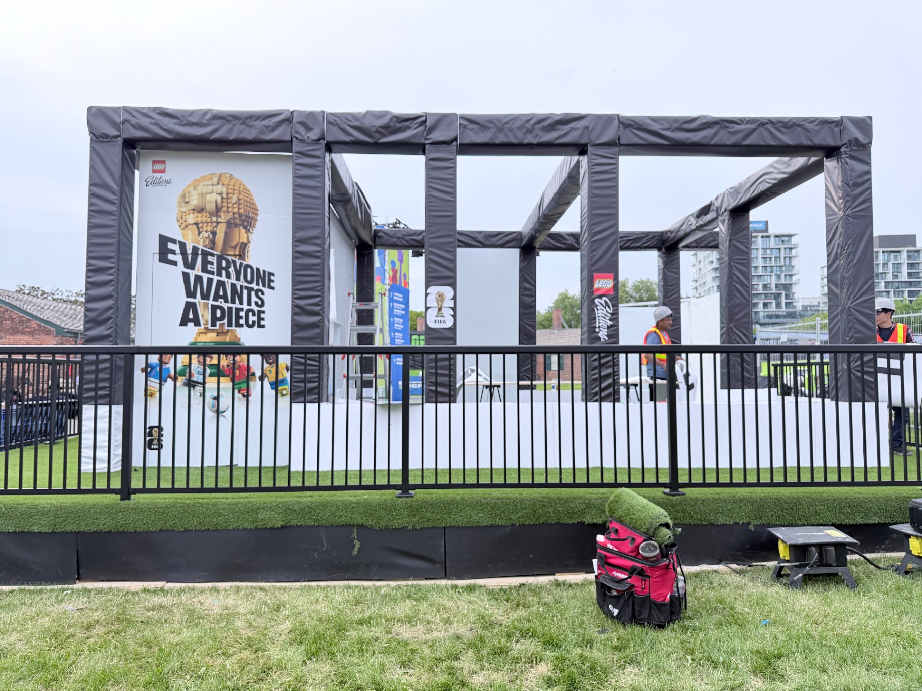 Inflatable structural frame of the LEGO Editions FIFA activation mid-build with crew on site
