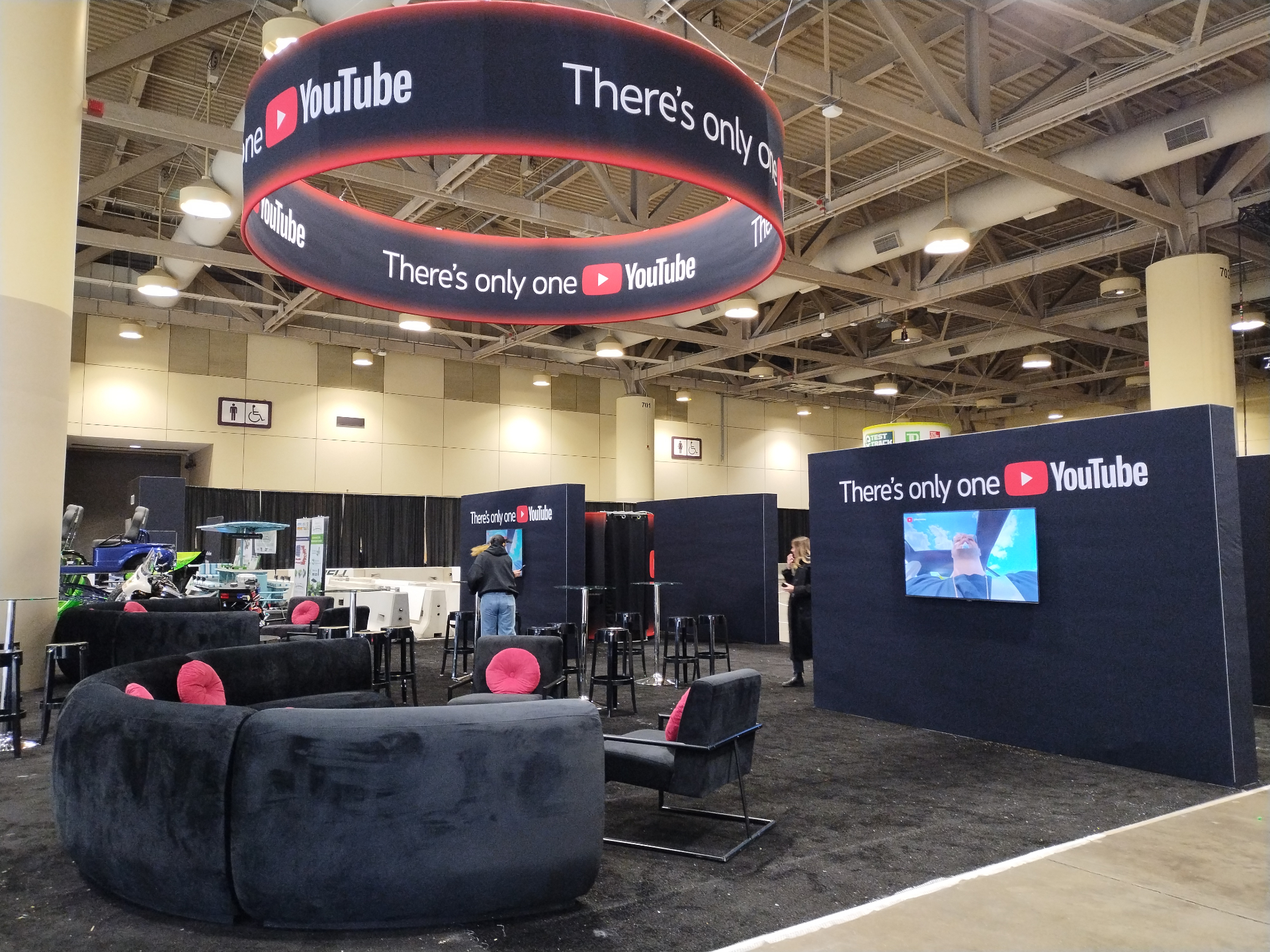 YouTube branded activation lounge with suspended overhead ring