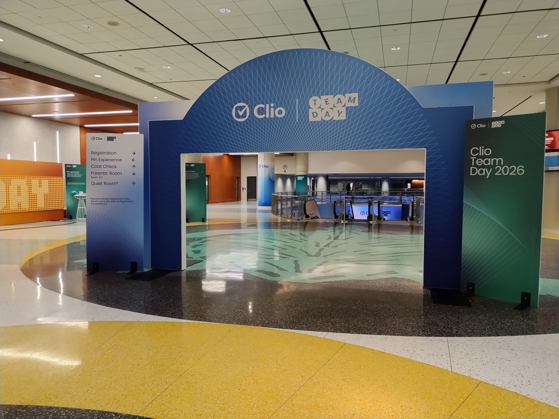 Clio Team Day branded entrance installation in a lobby