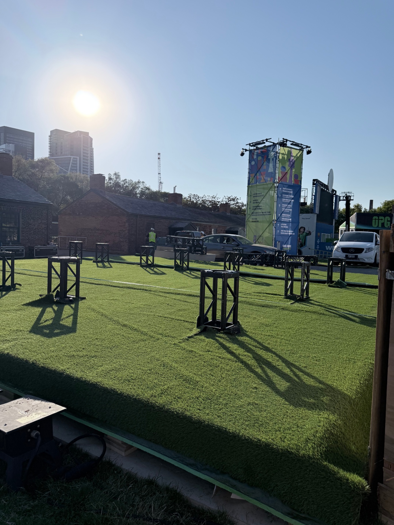 Finished elevated turf pitch with branded obstacle towers for the LEGO Editions FIFA activation